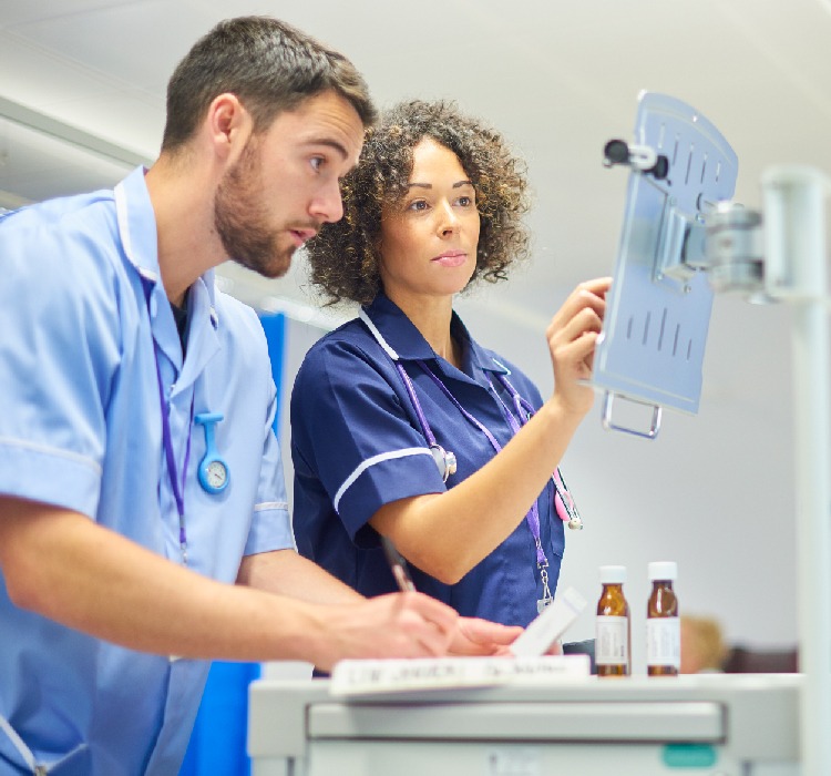 Nurses looked at the table data and took notes